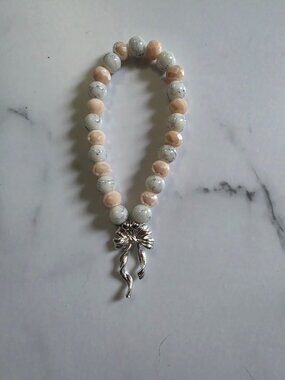 2 Pink and Marble Beaded Bracelets with Silver Bow